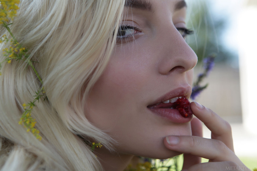  she devours a succulent raspberry between her luscious lips 05