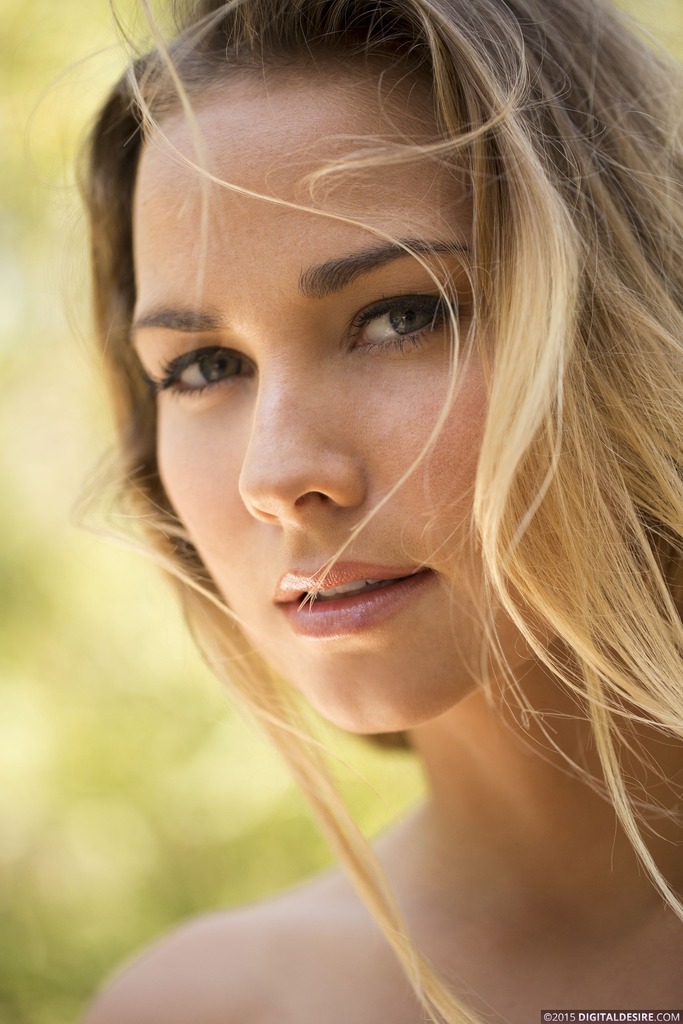 Beautiful blonde Courtney Dillon posing outdoor 01