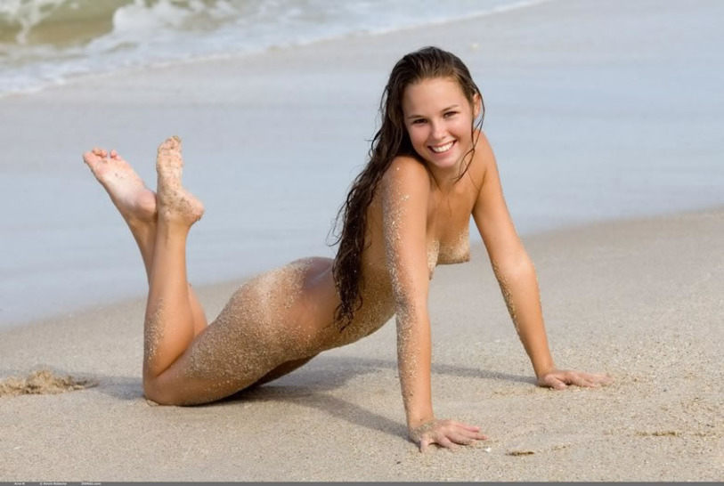 Aria posing naked on the beach 13