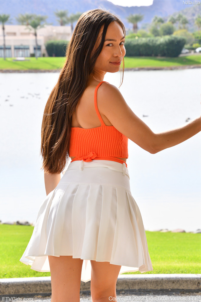 Orange Crop Top, White Mini Skirt and Platform Boots photo 12
