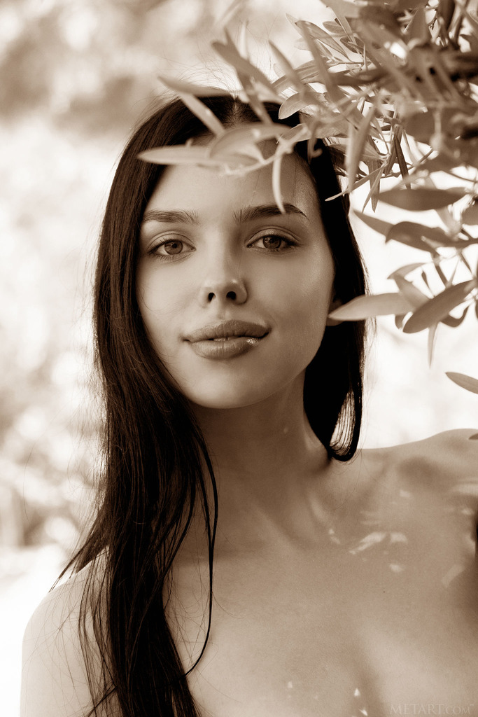 Nude Garden Posing Among Stone and Dense Greenery photo 20