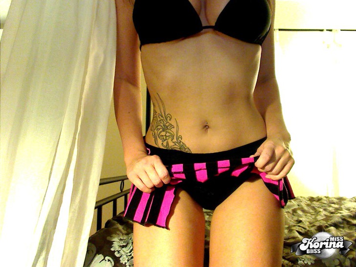 Korina Bliss shows off her Tits in a tiny black Bikini photo 7