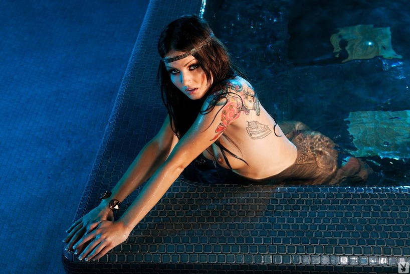 Veronica Lavery in a Blue-Lit Tattoo Portrait Set - photo 2