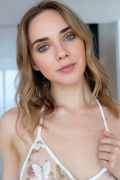Oxana Chic in Floral Bra and White Shorts