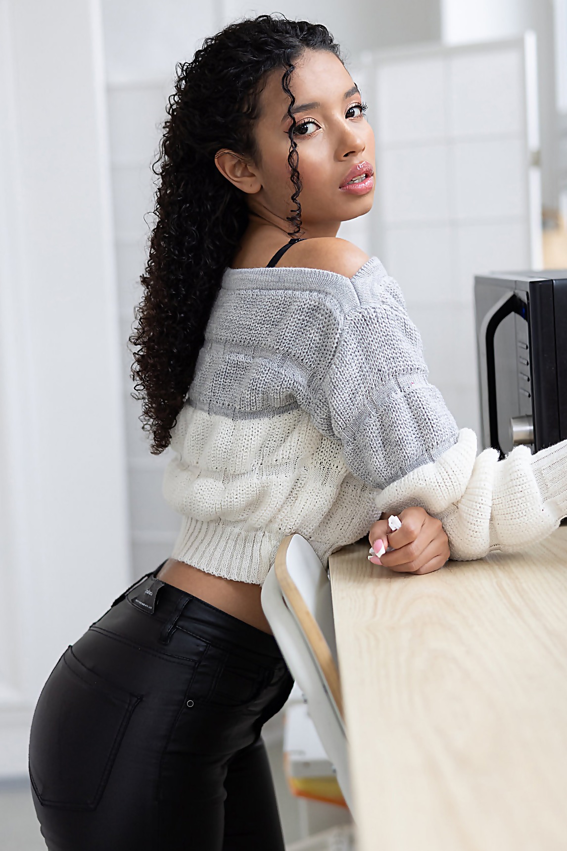 Gray Sweater Strip with a Pink Vibrator