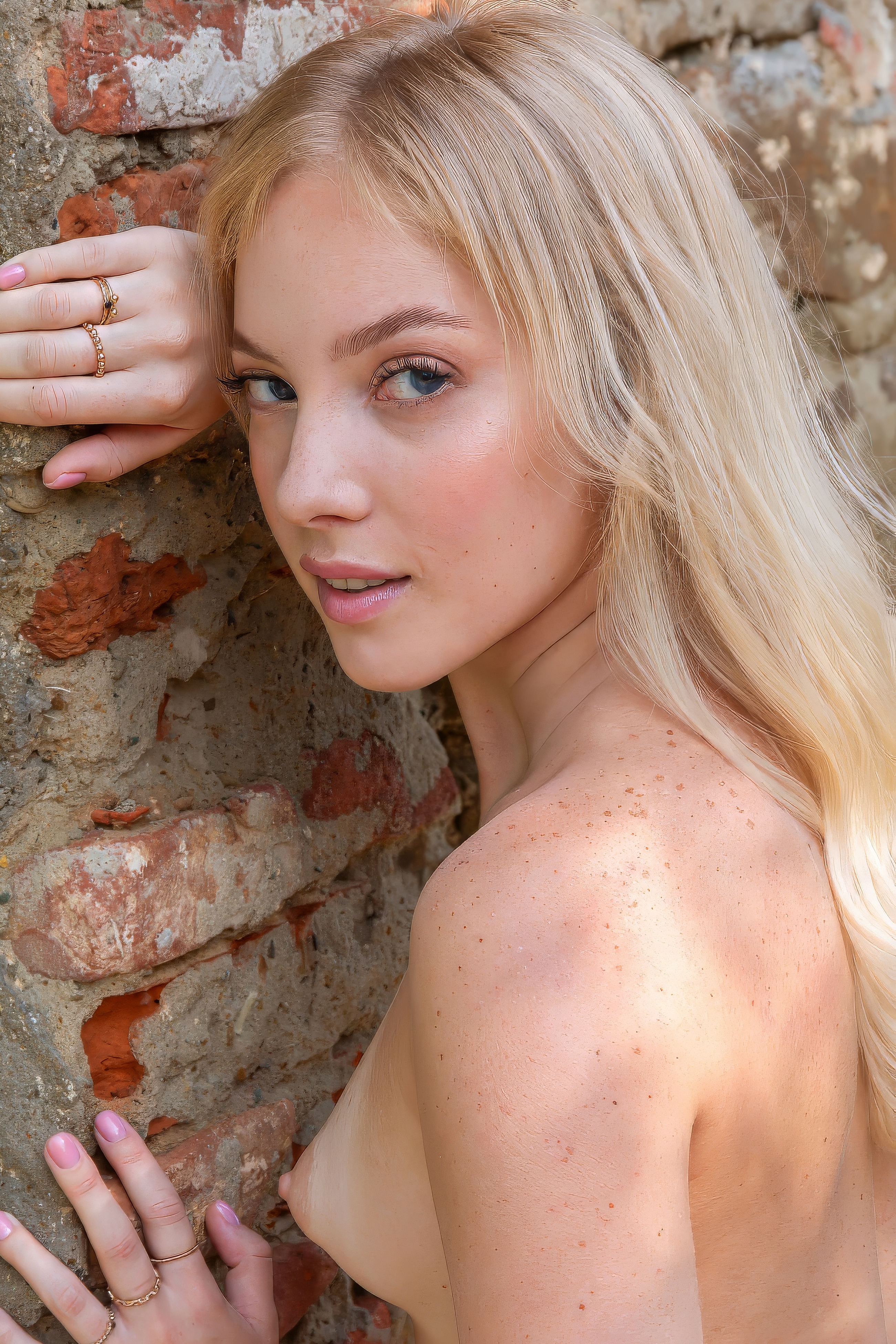 Coral Fabric and Sunlit Nude Poses Beside a Teal Wall