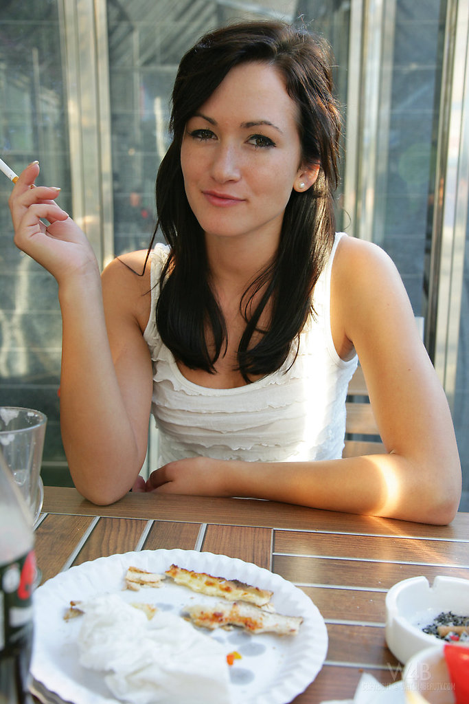 Nude Brunette Posing Inside a Train photo 1